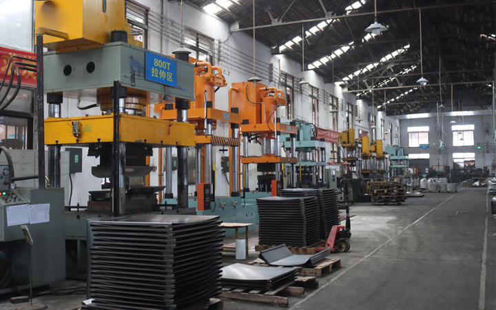 Engineering and sales teams collaborating on custom BBQ grill projects